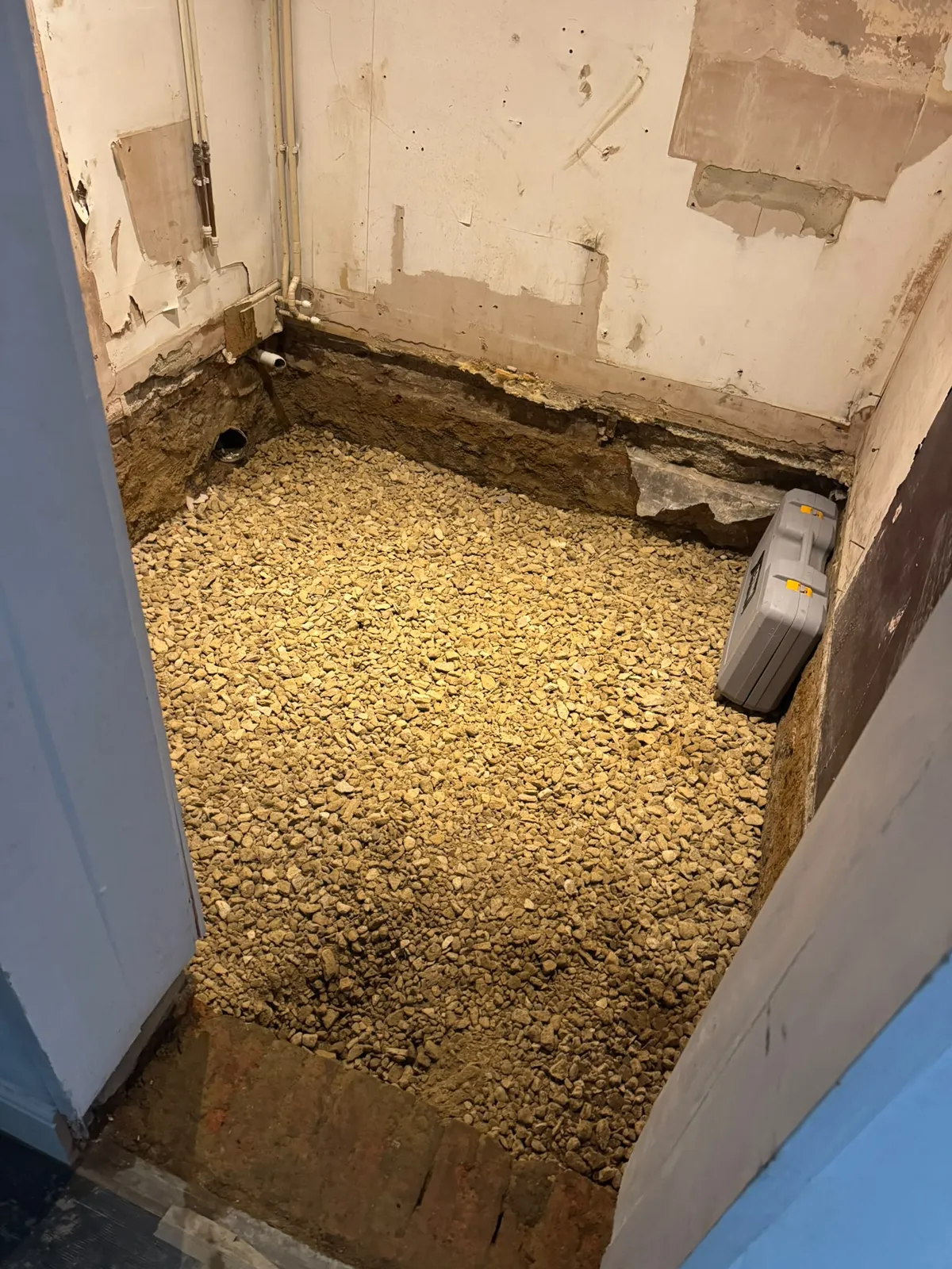 New aggregate layer laid in the stripped room for the Ewerby wet room project