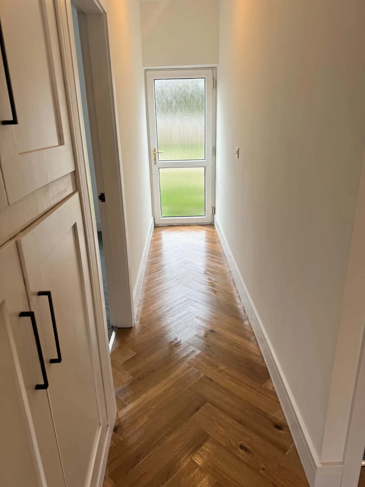 Timber internal door and refurbished hallway flooring in Bassingham