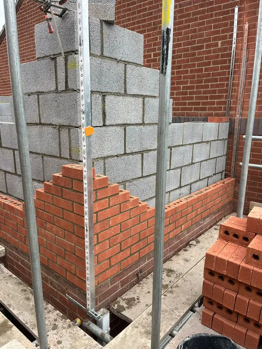 Brick and block cavity walls under construction at the Heckington extension