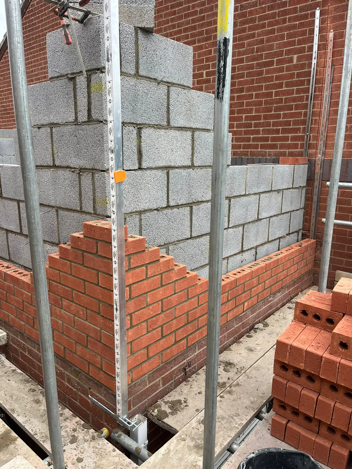 Brick and block cavity walls under construction at the Heckington extension